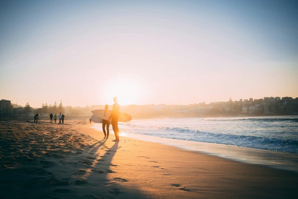 surfers on margaret river beach